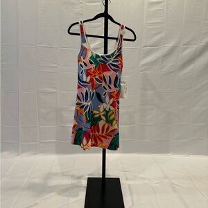 Cute golf or tennis dress with detached white shorts. New with tags.